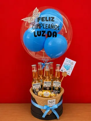 Cheers de Celebración: Caja de lujo con cinco Coronitas, Ferrero Rocher y globo burbuja personalizado — regalo a domicilio en Bogotá